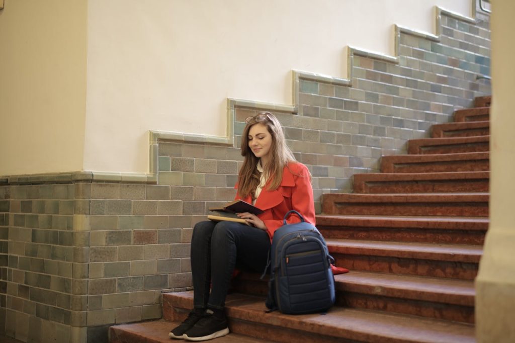 Student thinking about things to consider when choosing a college major. things to consider when choosing a college major